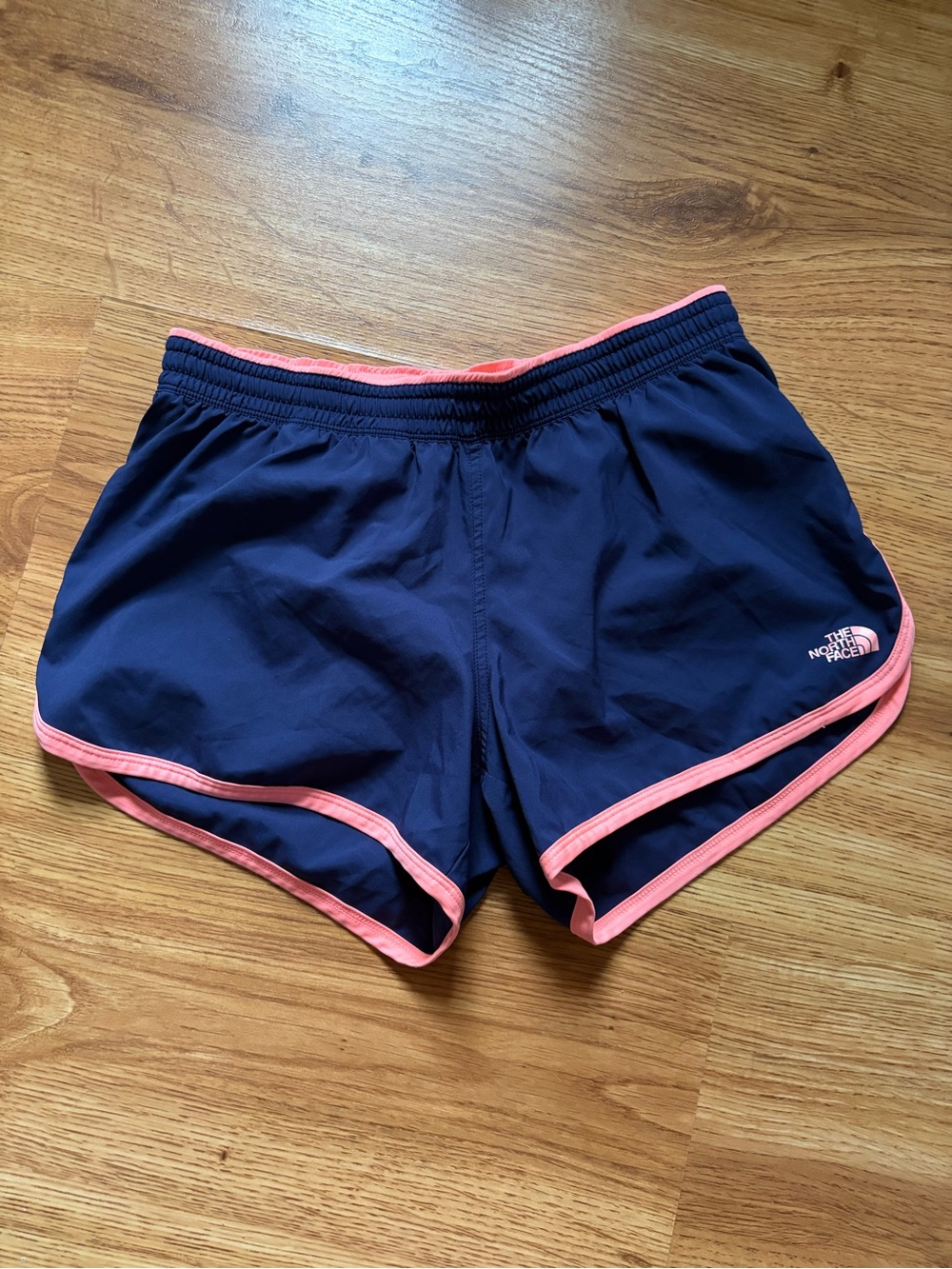 The North Face Women's Navy Blue Athletic Shorts with Pink Trim